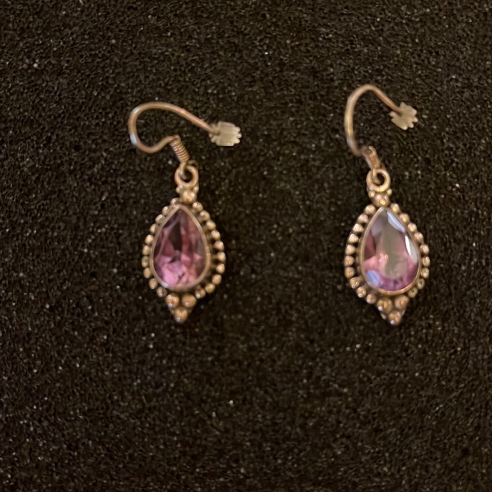 Gorgeous never used silver drop earrings with purple stones.
